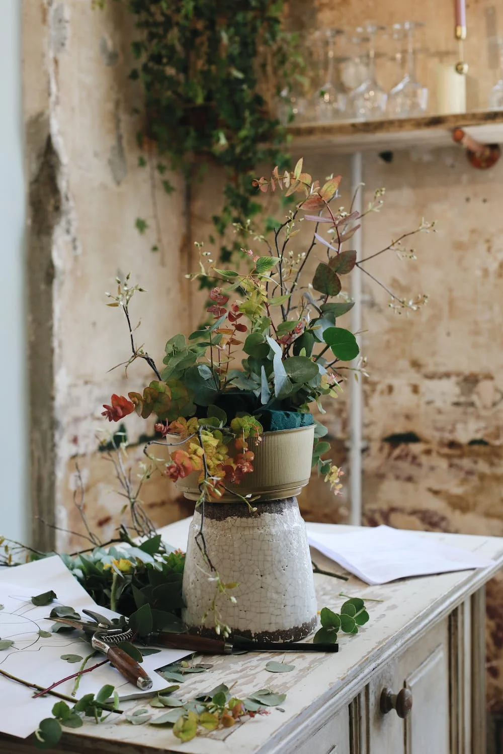 Flower arrangement in a pot on a table